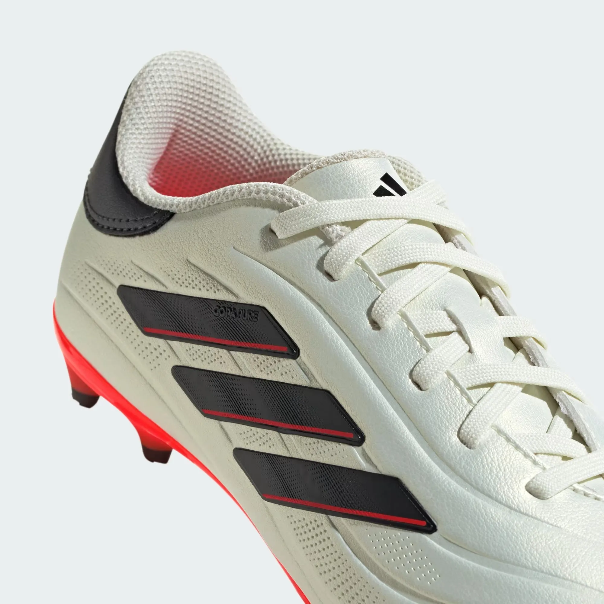 Junior Copa Pure 2 League FG [ Ivory/Core Black/Solar Red]